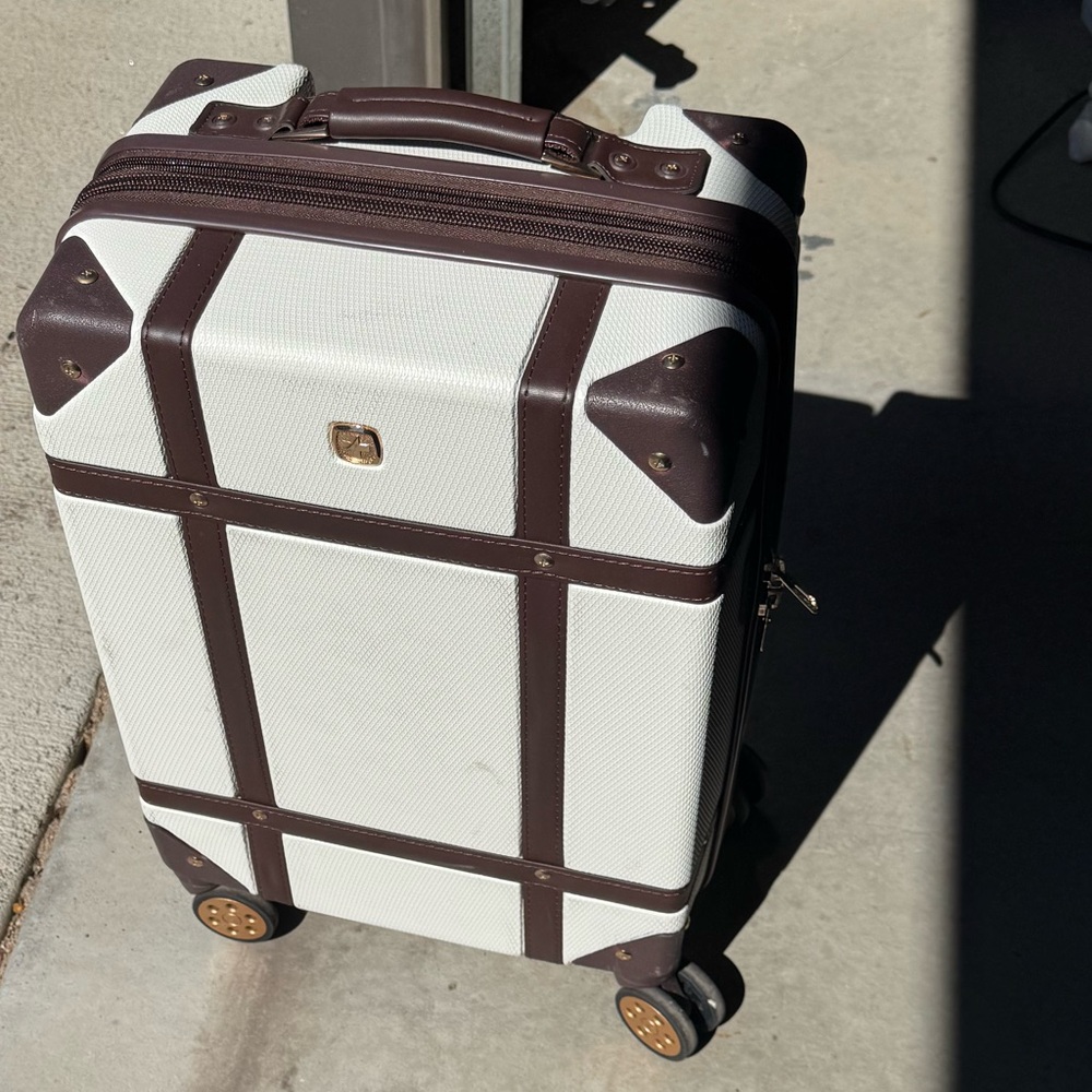 White and Brown Rolling Suitcase